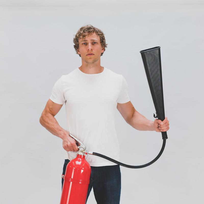 Problems cover art: Dylan Hand holding a fire extinguisher in front of a white background